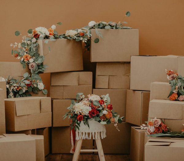 Image of boxes stacked with flowers on top